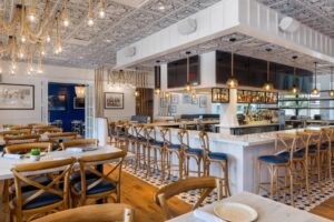 Interior of The Hampton Social at High Street in Dunwoody, GA—first Atlanta location; placement secured by Goldstreet Partners (10,455 SF).